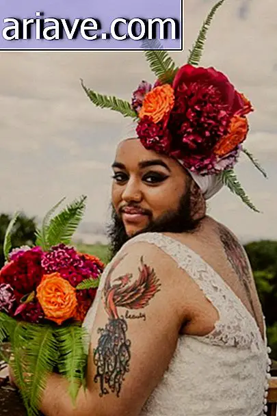 Breaking Taboo: Femme pose en robe de mariée avec des fleurs à la barbe