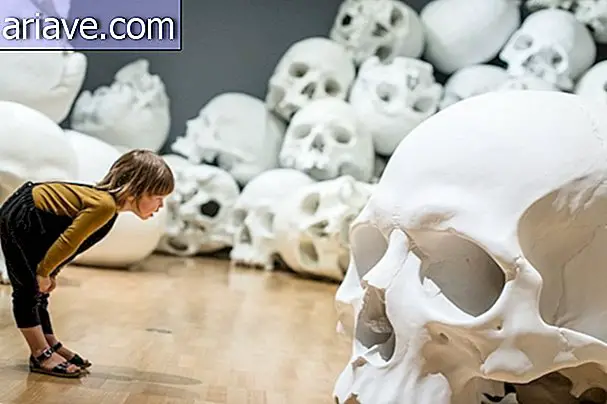 Girl looking at skull