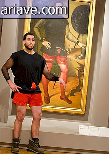 Posing with painting