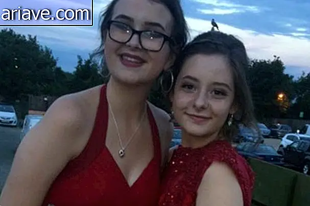 Two girls posing for photo